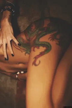 nude tattoo picture with amazing dragon in on this super teen body of this lady