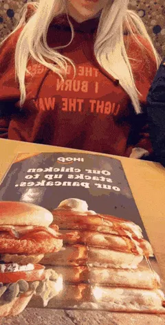 in the restaurant pulling out her perfect titties