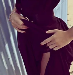 sexy woman shows her thong under skirt
