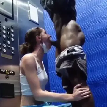 White slut blowing bbc in elevator
