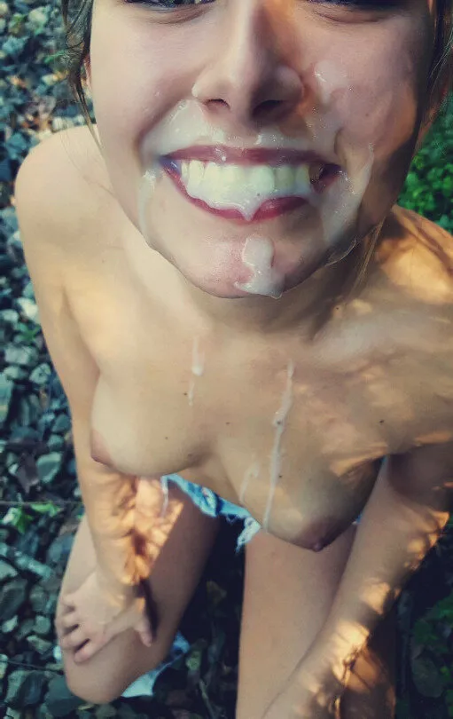 cum bukkake on her body with her mouth full of cum