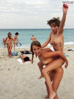 teens having fun in beach voyeur