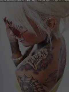 blonde full body tattoo babe with super sexy ink sin and tan pussy