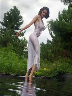 see through dress wading in the water