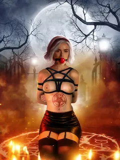 sabrina awaits the arrival of horny demons to help her complete a sex ritual.