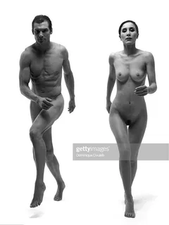 man and woman running naked