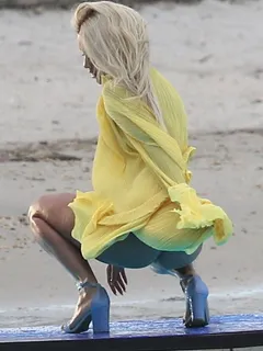 rita ora upskirt wardrobe malfunction accidentally flashing her nude ass during a video shoot in miami seen by paparazzi.