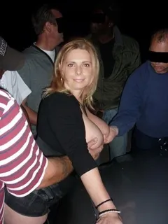 she likes these guys groping her boobs.