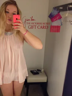 pretty blonde girlfriend changing room selfie