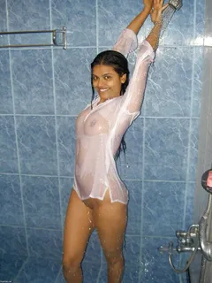 sexy indian bhabhi posing semi nude in bathroom