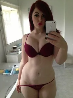 curvy redhead in sexy bra and tiny panties