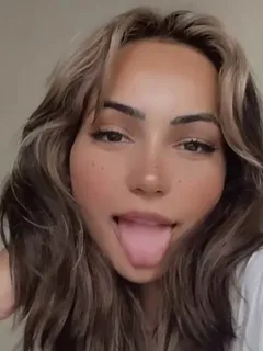 pretty babe with her tongue out for cum