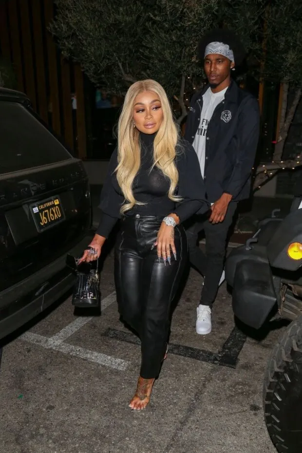 blac chyna braless boobs in a see through top showing off her big tits and pierced nipple while out to dinner with a new boyfriend.