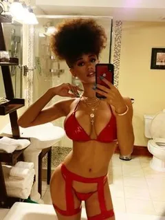 stormi maya in a red bikini