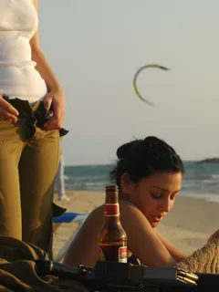 israeli female soldiers, beach, beer