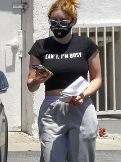 ariel winter braless boobs in a sexy little black crop top showing off her big tits also wearing a mask seen by paparazzi out shopping.