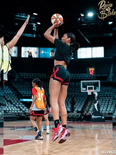 a’ja wilson shooting hoops in booty shorts