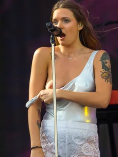 tove lo flashes the crowd while performing onstage at the rock in rio festival in las vegas.