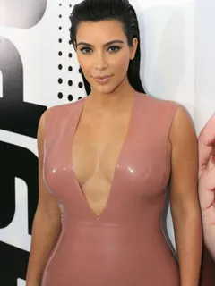 kim kardashian busting out of shirt