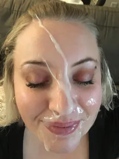 check out this pretty ass bitch with all that cum on her face