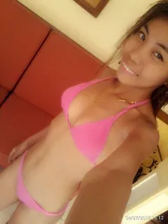 philippines 18 year old beauty in a skimpy pink bikini with a beautiful pinay smile