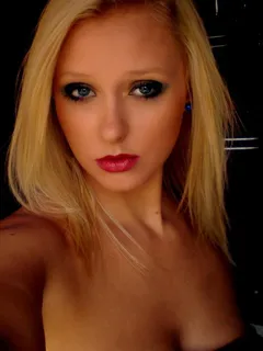 dolled up bimbo with strong makeup perfect for future cumshots