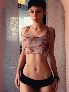 short hair alt hottie in a crop top