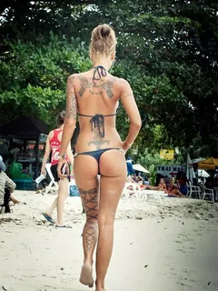 sexy inked blonde with amazing ass in thong bikini