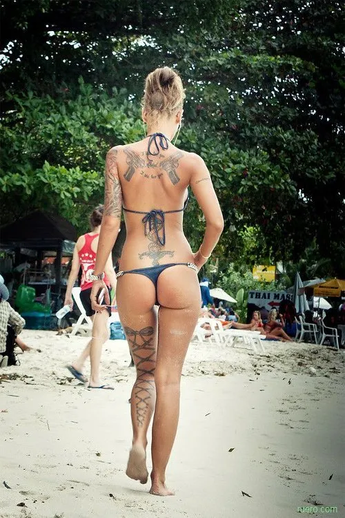 sexy inked blonde with amazing ass in thong bikini