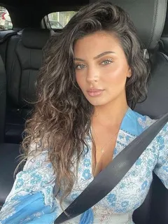 beautiful woman in a car