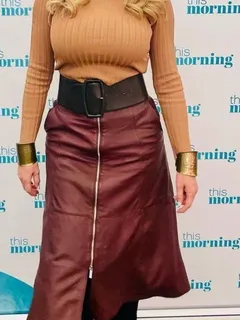 carol huge boobs brown top and skirt