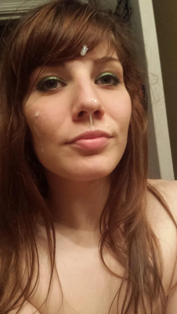 a lovely, fresh amateur face but...she has cum on her face and is having her photo taken.