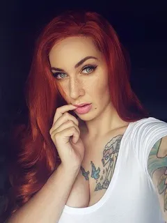 big tit tatted redhead selfie