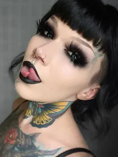 goth woman with a split tongue