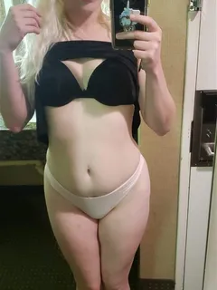 blonde chick in her hotel room waiting to do porn scenes