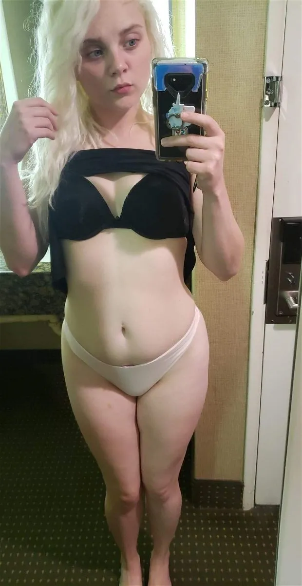blonde chick in her hotel room waiting to do porn scenes