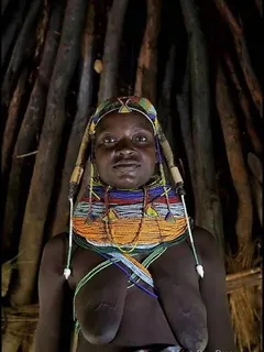 african tribal showing long floppy tits in her hut