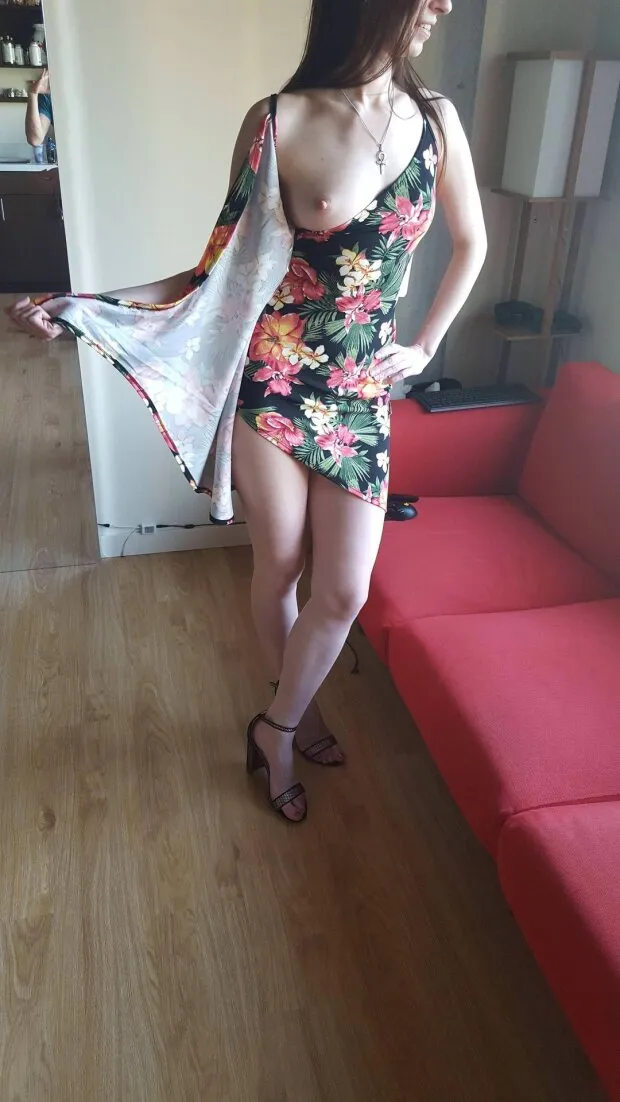sexy brunette in tight dress flashing her tits with sexy legs and ankle strap heels
