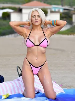 busty blonde courtney stodden in pink bikini on a beach