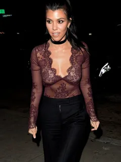 kourtney kardashian bares her chest