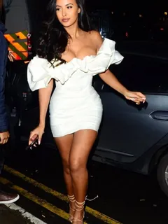 maya jama big boobs showing nice cleavage in a sexy little minidress seen by paparazzi in london.