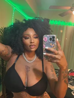 sophia ifeoma taking a selfie in her bra and thong