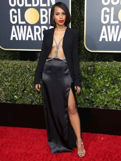 kerry washington braless boobs showing nice cleavage topless in just an open black jacket photographed arriving to the golden globe awards.