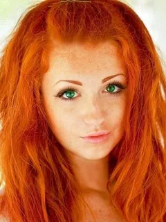 adorable redhead with green eyes