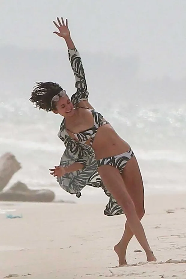 nina dobrev areola slip on the beach