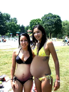 two sexy preggo girls in bikinis