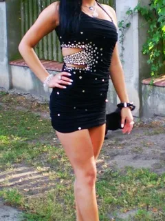 brunette bimbo going for a party in her new slutty sparky mini black dress