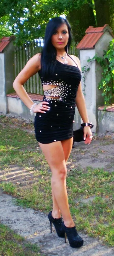 brunette bimbo going for a party in her new slutty sparky mini black dress