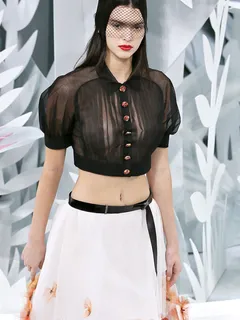 kendall jenner wears a see through shirt for chanels spring summer fashion show in paris