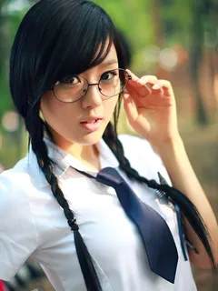 cute asian schoolgirl doing her teacher